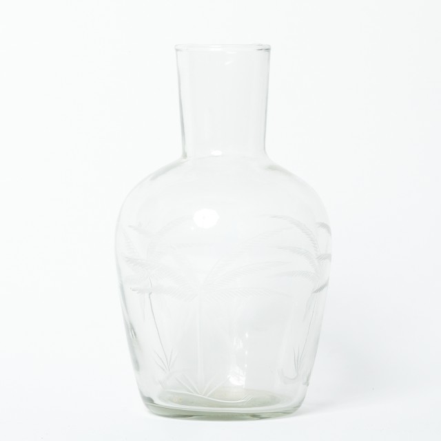 Vaso in vetro trasparente decorato con palma